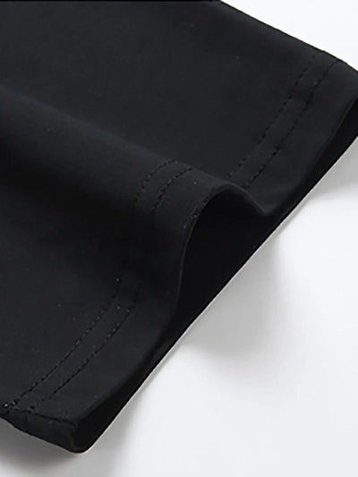 Close-up of black cotton fabric showcasing stitching details of the Cotton Flag Print Tee by BONEHEAD PRO-CREATIONS.