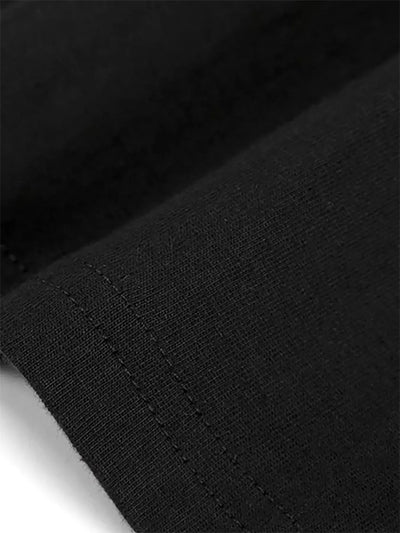 Close-up of the fabric texture and stitching of the Cotton Flag Print Tee by BONEHEAD PRO-CREATIONS.