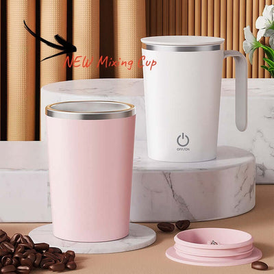 Kitchen electric mixing cups in pink and white on marble surface, ideal for automatic coffee mixing.