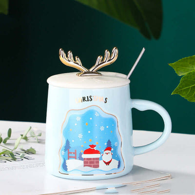 Ceramic Christmas mug with reindeer lid and spoon, featuring festive Santa design, perfect holiday gift for coffee lovers.