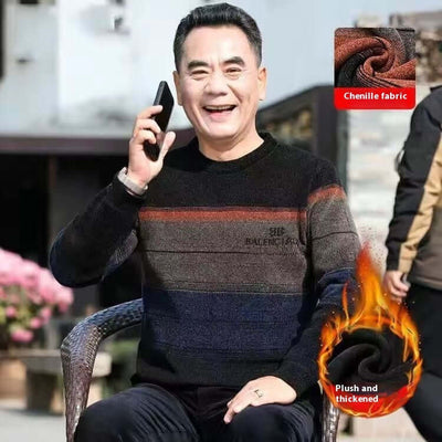 Middle-aged man wearing a fleece-lined chenille sweater, smiling and talking on smartphone outdoors in winter.