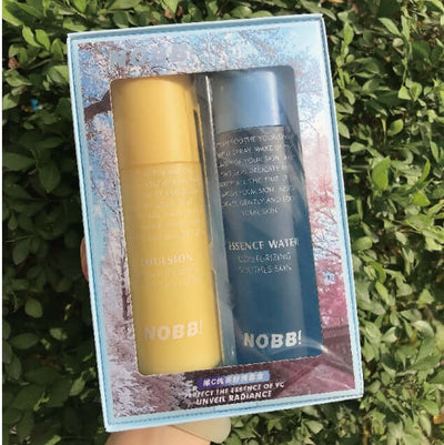 Moisturizing water and essence milk set in packaging, promoting hydration and radiant skin.