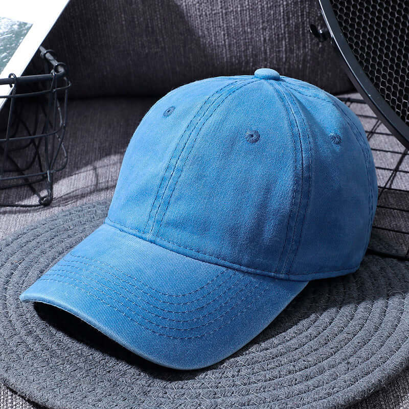 Washed blue baseball cap for men and women, distressed cotton sun hat by BONEHEAD PRO-CREATIONS, all-match style.