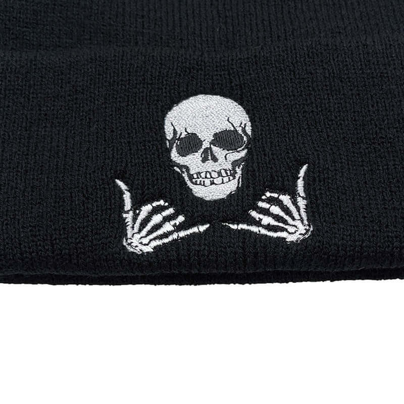 Black knitted hat with skull and skeleton hand emblem, perfect for both men and women, BONEHEAD PRO-CREATIONS.