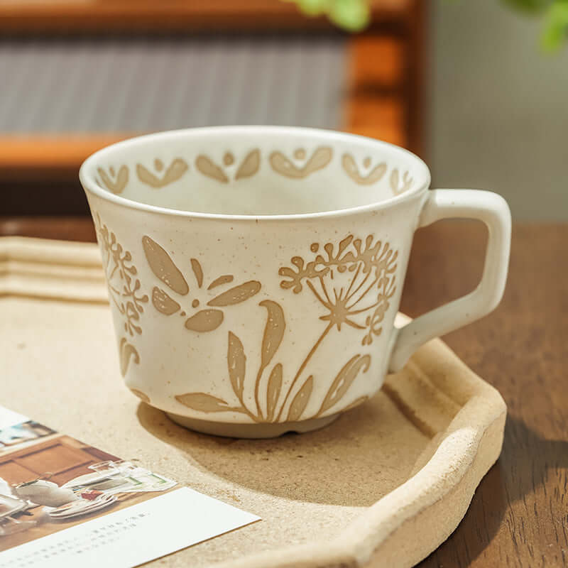 Hand-painted minimalist Nordic ceramic mug with floral design, ideal for modern home decor.