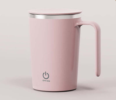 Pink electric mixing cup with lid and handle, designed for automatic stirring of beverages.