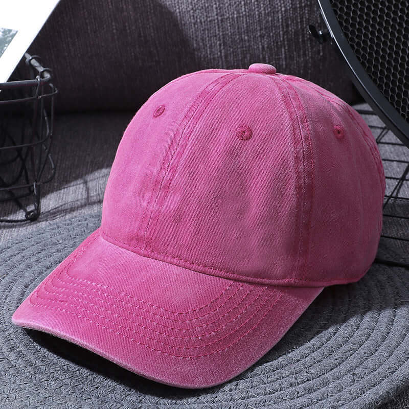 Washed pink baseball cap for men and women by BONEHEAD PRO-CREATIONS, perfect for outdoor casual wear.