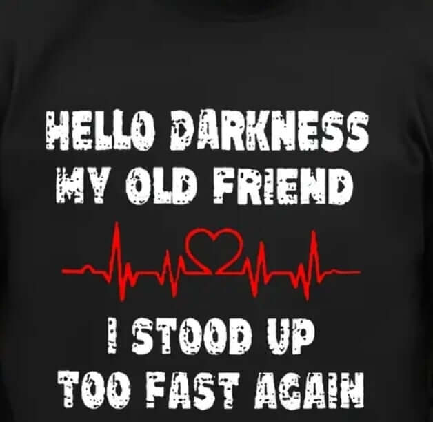 Hello Darkness Tee by BONEHEAD PRO-CREATIONS with humorous text and heart design, perfect for adding humor to dark times.