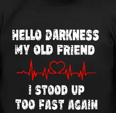 Hello Darkness Tee by BONEHEAD PRO-CREATIONS with humorous text and heart design, perfect for adding humor to dark times.